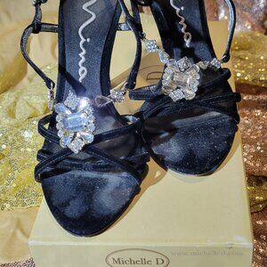 Women's black strappy eligent4 inch heels with stones in a size 6.5 by Michele D